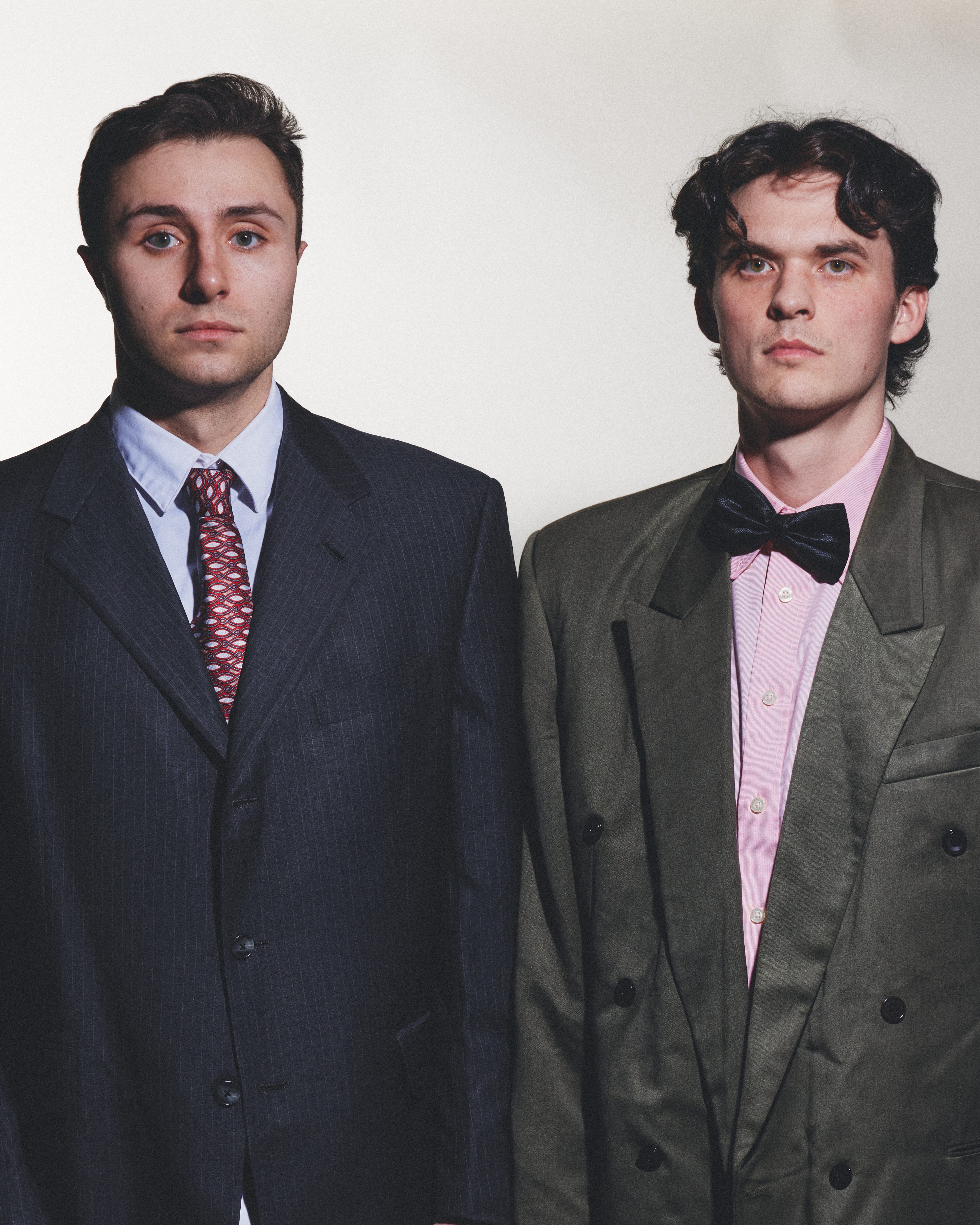 The two Breaking & Entering hosts in vintage suits