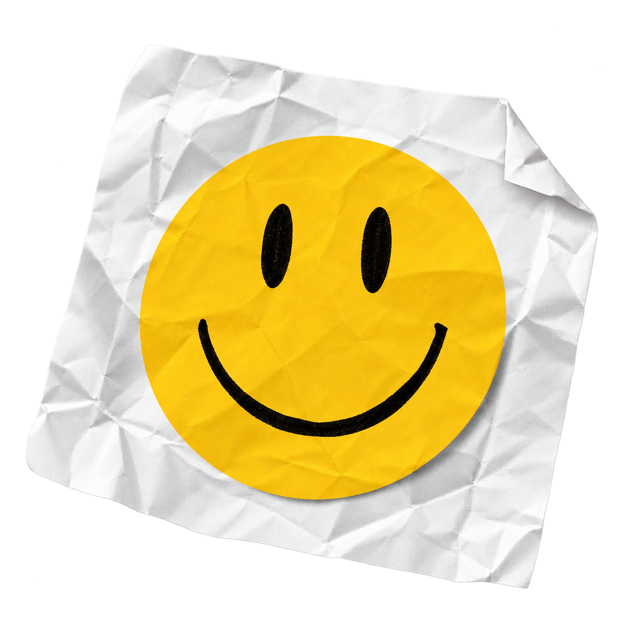 Smiley face sticker on crumpled paper